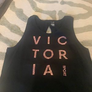 Pink sparkle letter on black. Never worn